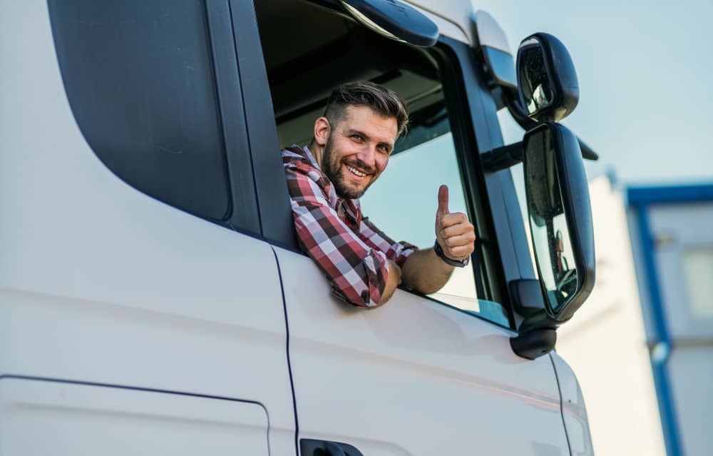 A happy cargo truck driver.