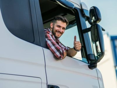 A happy cargo truck driver.